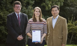Jemma Walker (centre) with Professor Christopher Tredwin (left) and Dr Bing Hu (right)