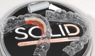 Figure 5: The Solid retainer comes in a sealed pouch within a metal retainer tin
