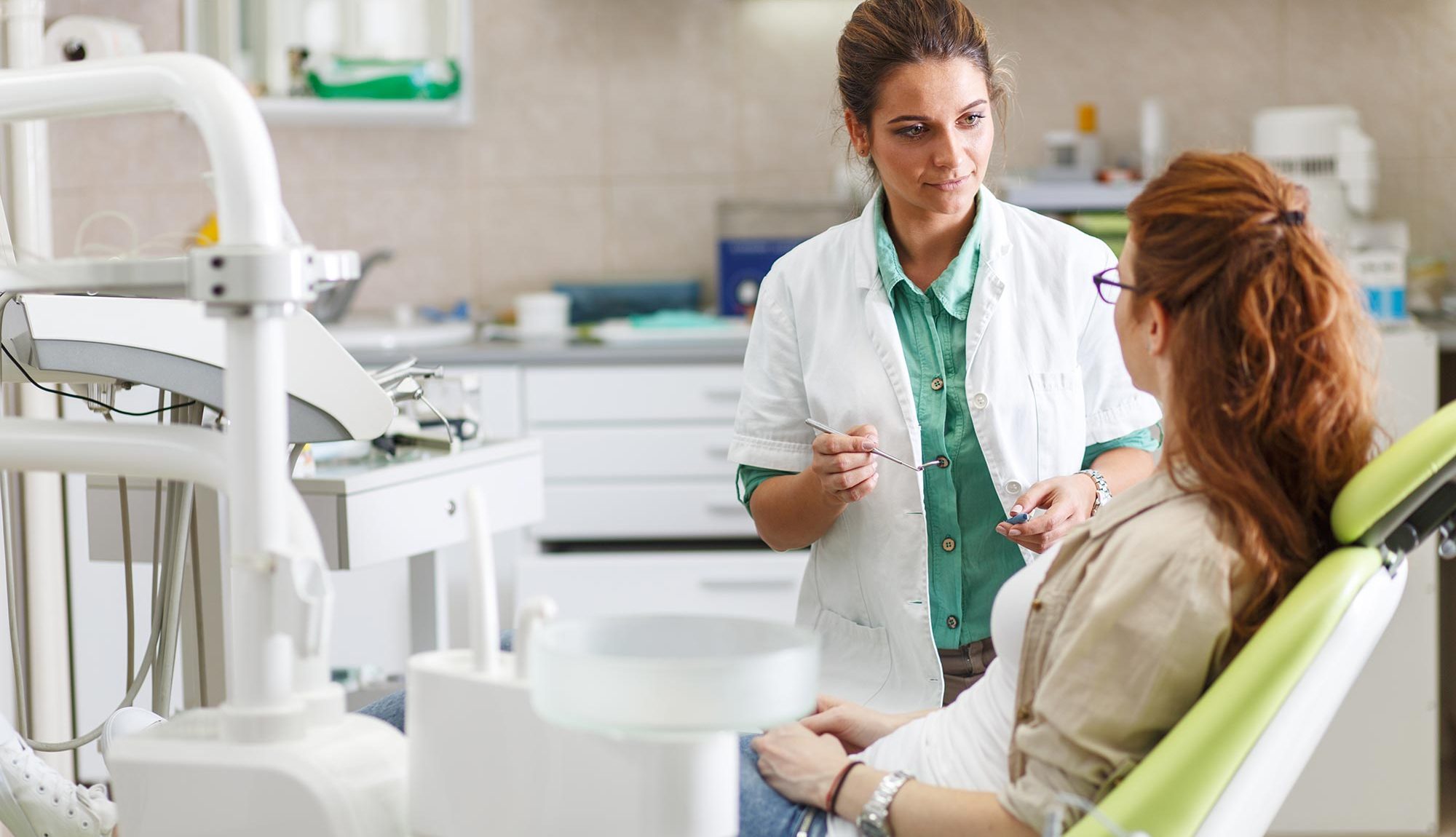 dental patient talking to dentist