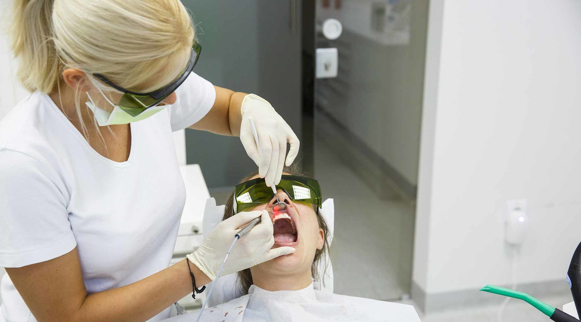dental therapist working on patient